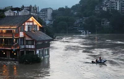 Guizhou floods: 10,000 evacuated as torrential rain triggers red alert
