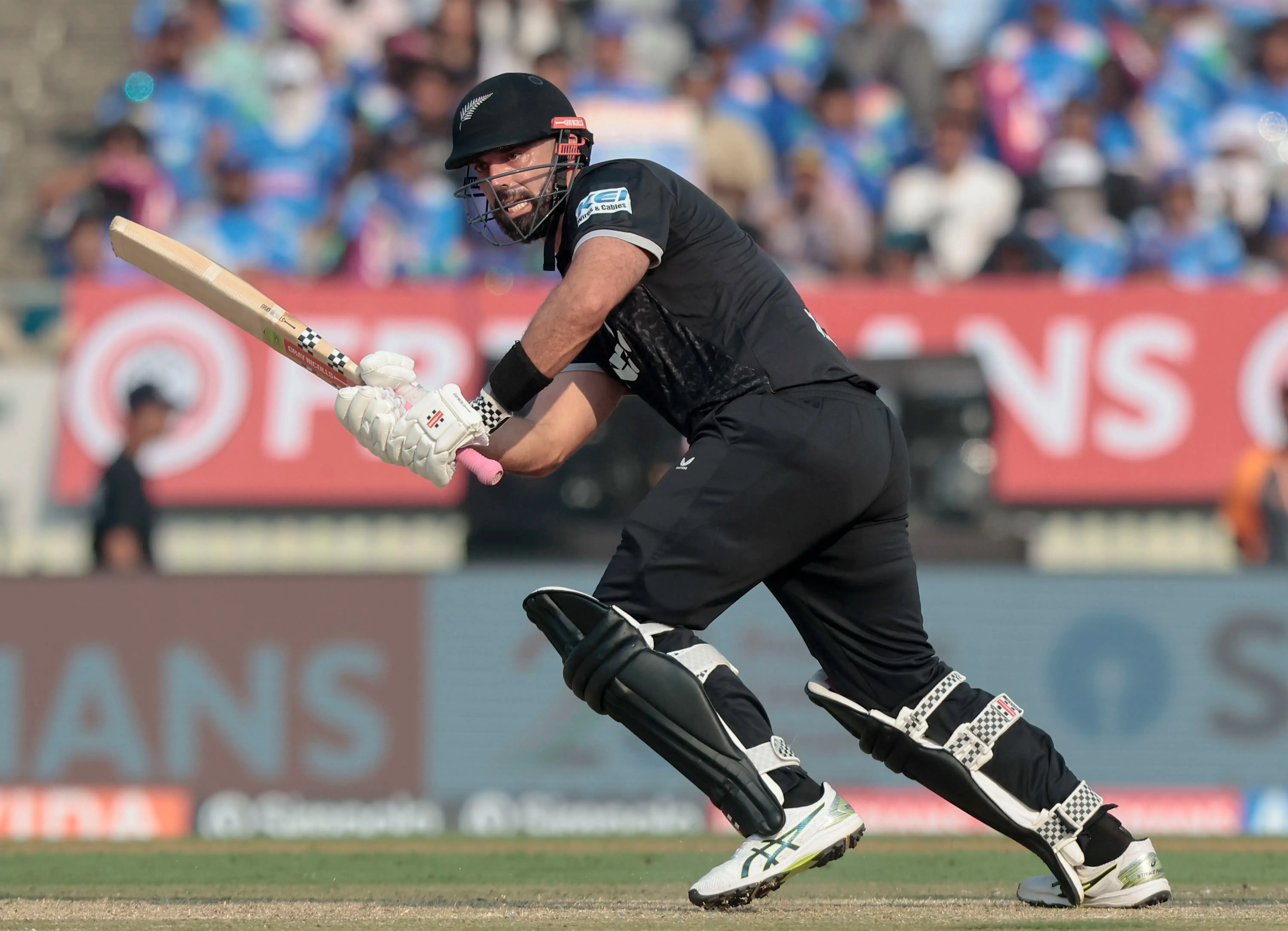 How did Daryl Mitchell’s 84 help New Zealand set a 301-run target for India?