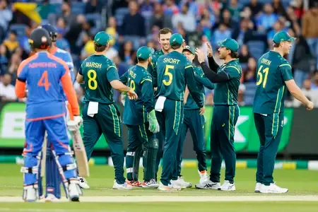 How did Hazlewood and Marsh lead Australia to a four-wicket victory over India?