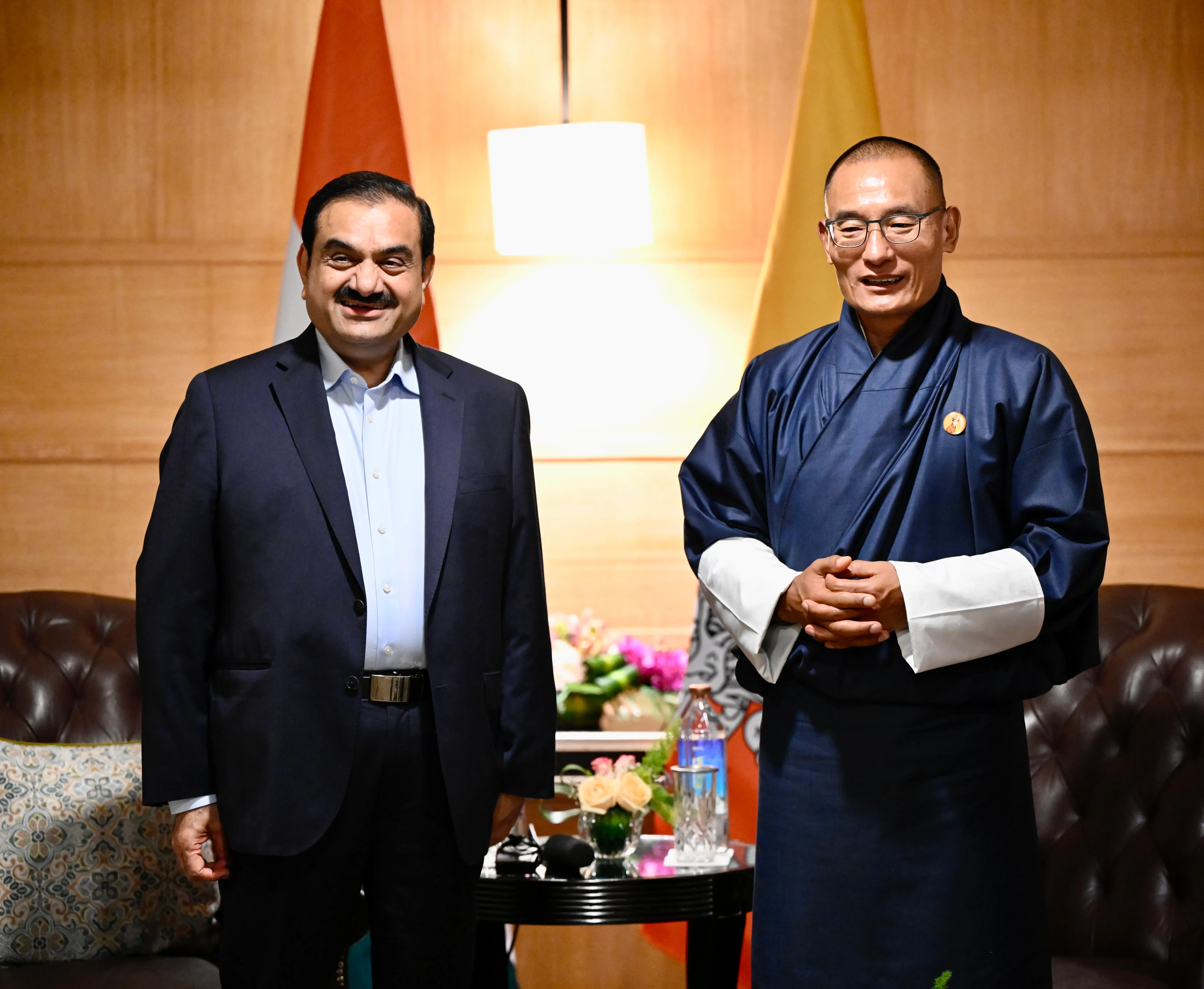 How are Adani Power and Druk Green Power Collaborating on a 570 MW Hydropower Project in Bhutan?