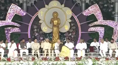 Aishwarya Rai Bachchan touches PM Modi’s feet at centenary celebrations of Shri Sathya Sai Baba