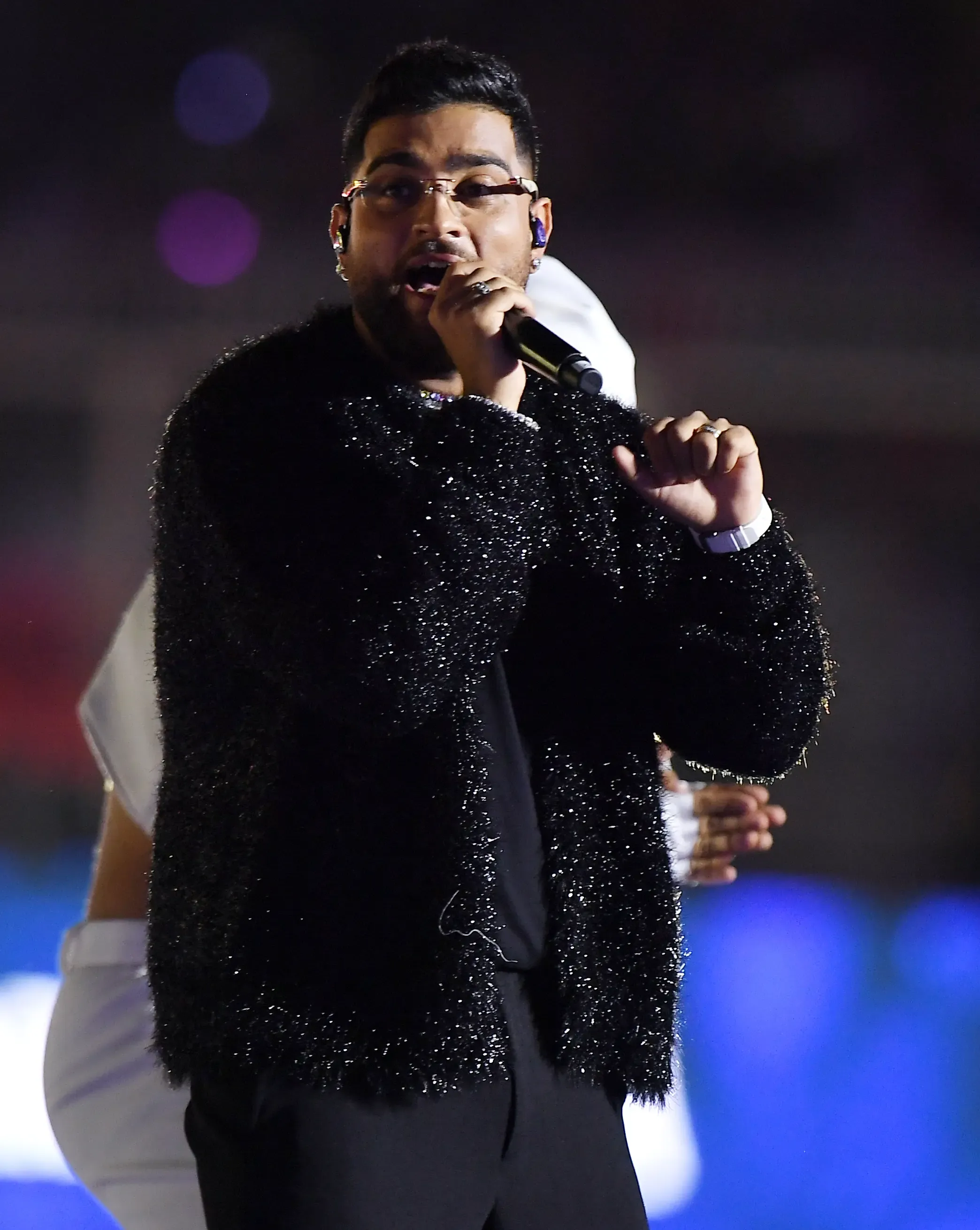 Is Karan Aujla's India Tour Extension Amid Controversy a Bold Move?