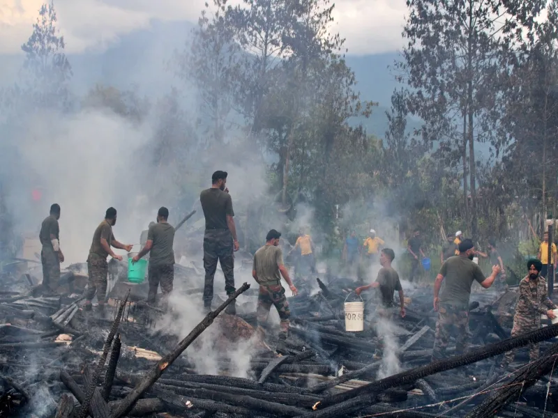How Did the Army Avert a Major Fire Disaster in Kaying Village?