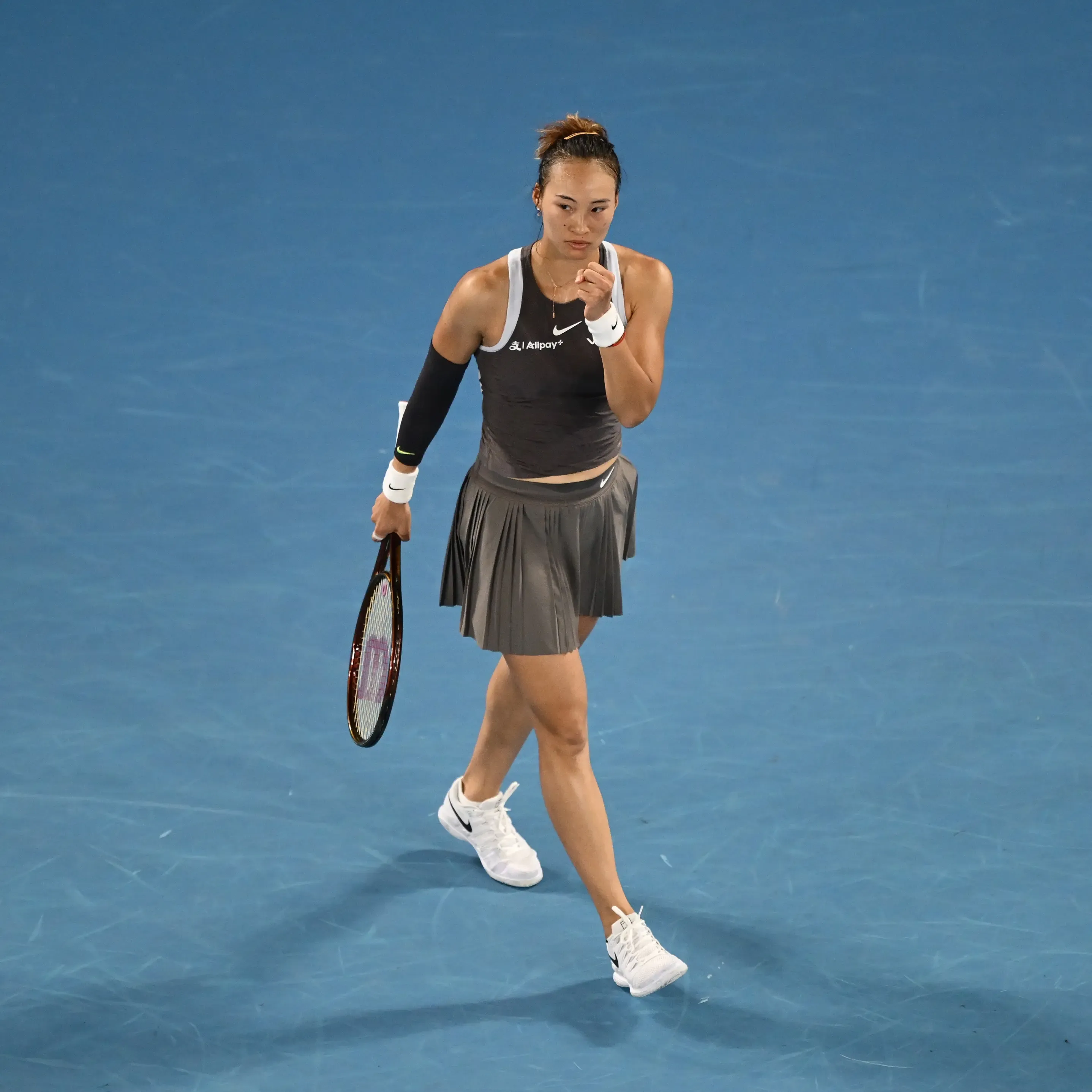 Australian Open: Zheng and Mirra Secure Wins as Heavy Rain Halts Outdoor Matches