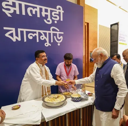 PM Modi savours jhalmuri at NDA meet as Bengal CM Adhikari serves iconic snack