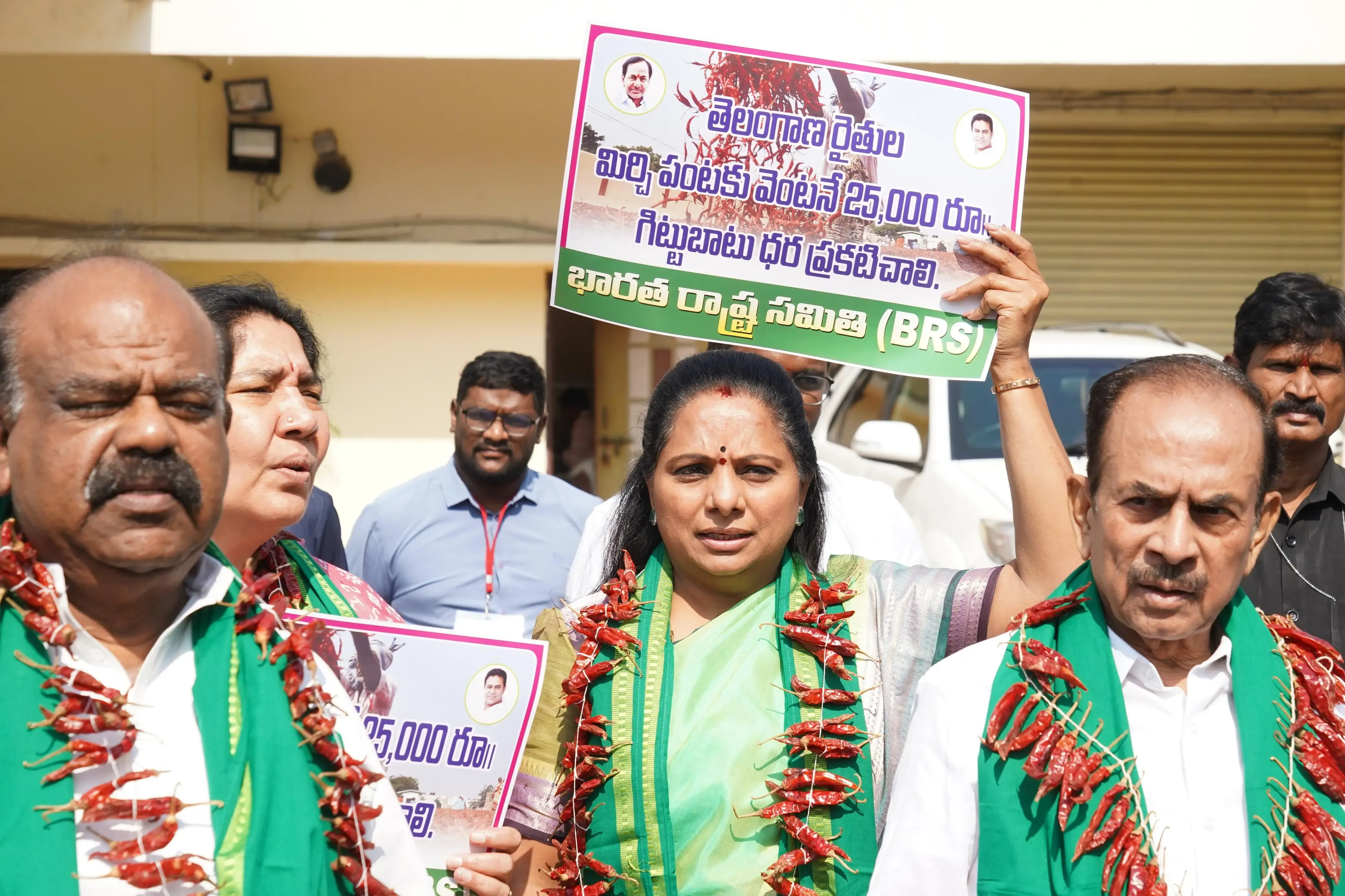 BRS MLCs Conduct Unique Protest Adorning Chilli Garlands in Telangana