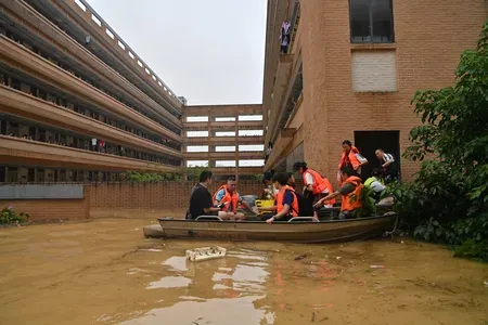 China raises flood alert to yellow as Typhoon Bavi lashes vast regions