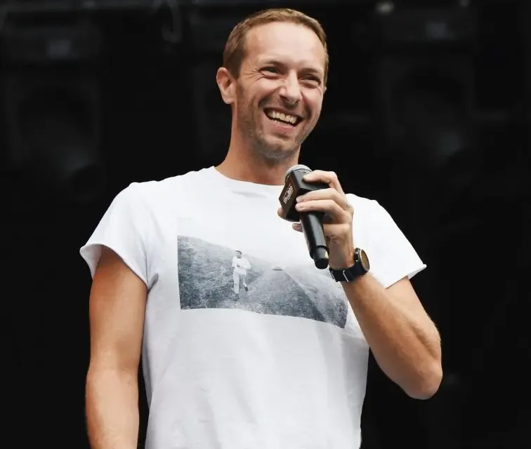 Did Chris Martin Leave Newlyweds Speechless with a Surprise Performance?