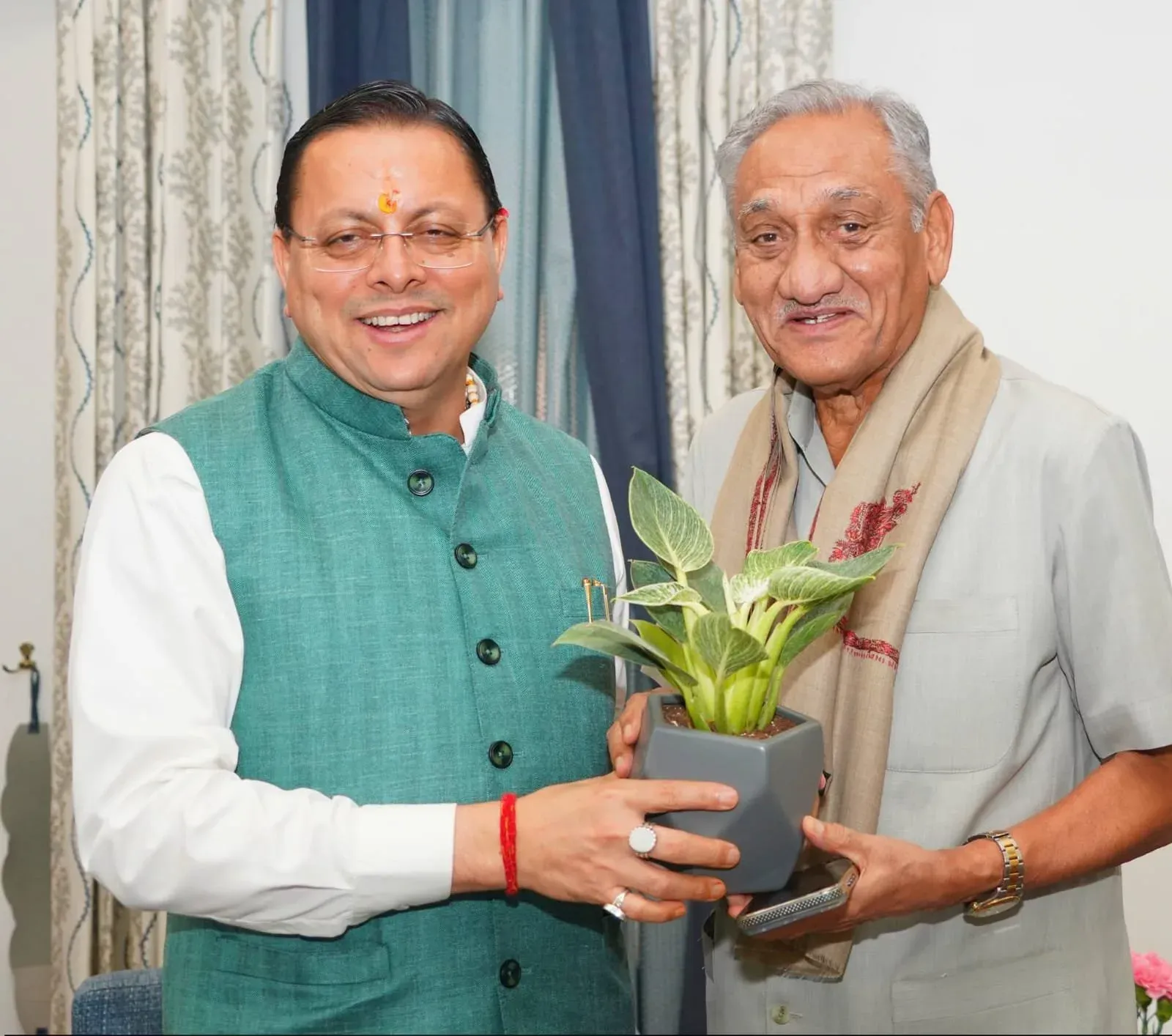 CM Dhami Meets Ex-CM Bahuguna at CM Residence
