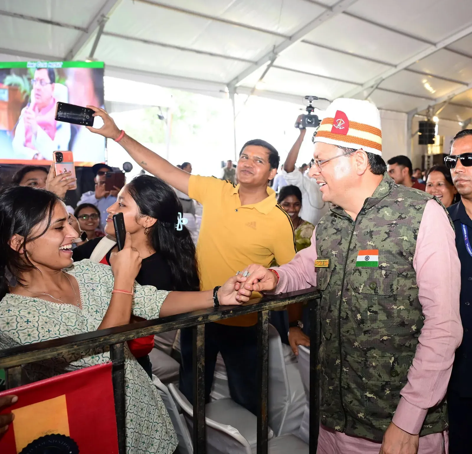 CM Dhami Moved by Youth, Veterans and Women at Public Event