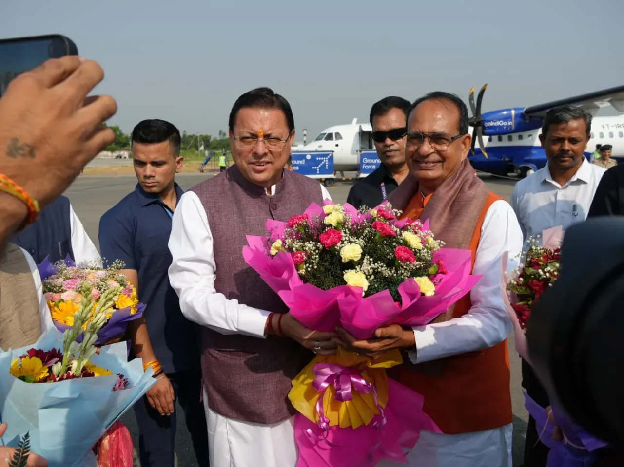 CM Dhami Receives Union Agri Minister Chouhan at Pantnagar Airport