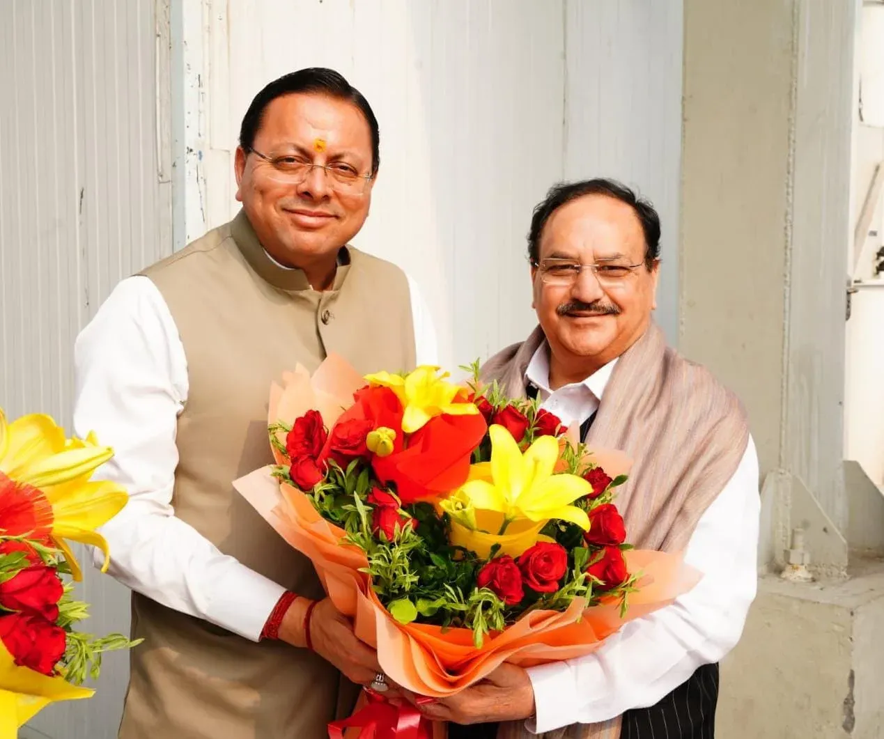 CM Dhami Welcomes Health Min Nadda at Dehradun Airport