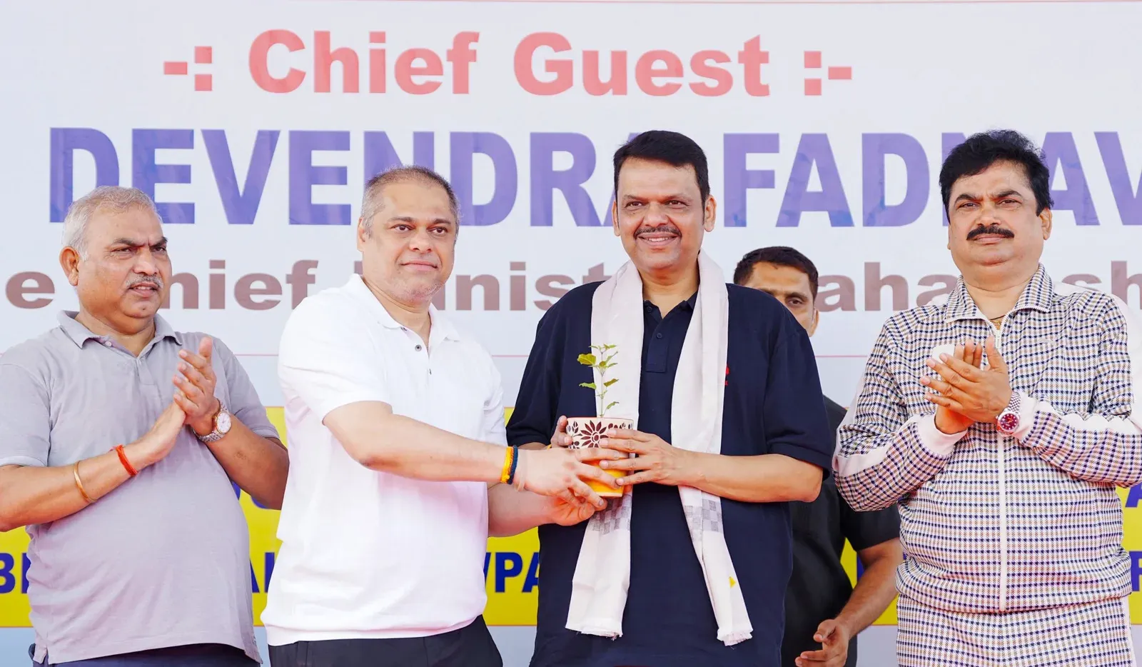 CM Fadnavis leads 'Yoga on the Beach' at Juhu on Int'l Yoga Day