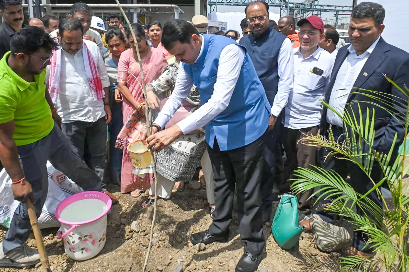 CM Fadnavis plants trees at Nagpur's solid waste centre