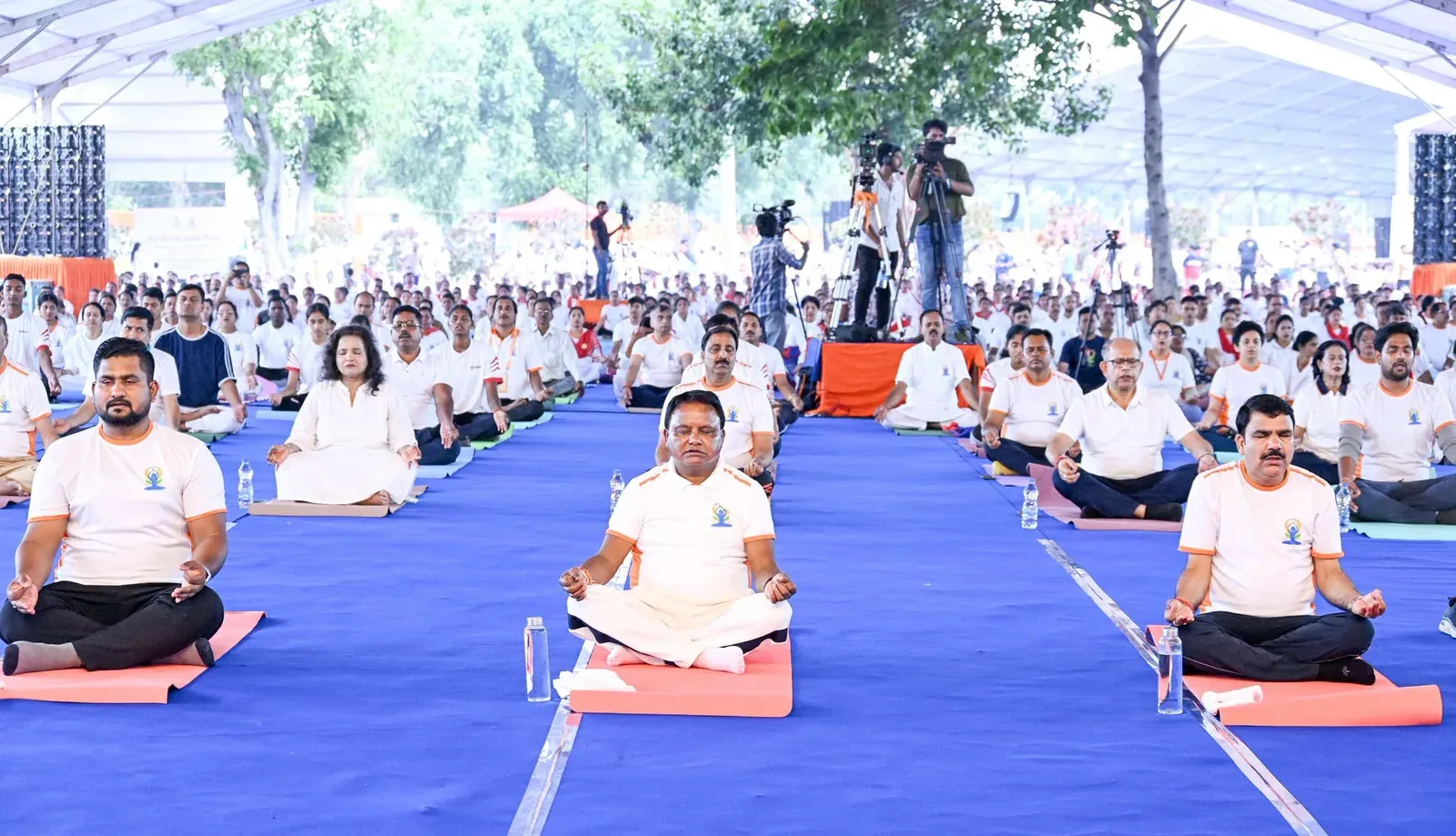CM Majhi joins mass yoga session at Kalinga Stadium on Yoga Day