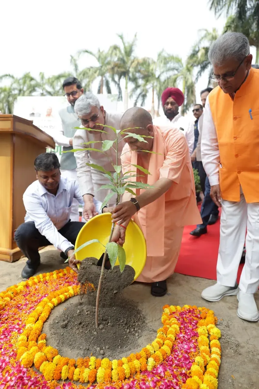 CM Yogi Plants Mango Sapling on World Environment Day