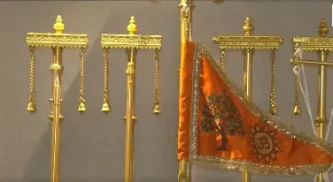 What is the significance of the majestic flag being prepared by an Ahmedabad firm for the Ram Mandir ceremony?