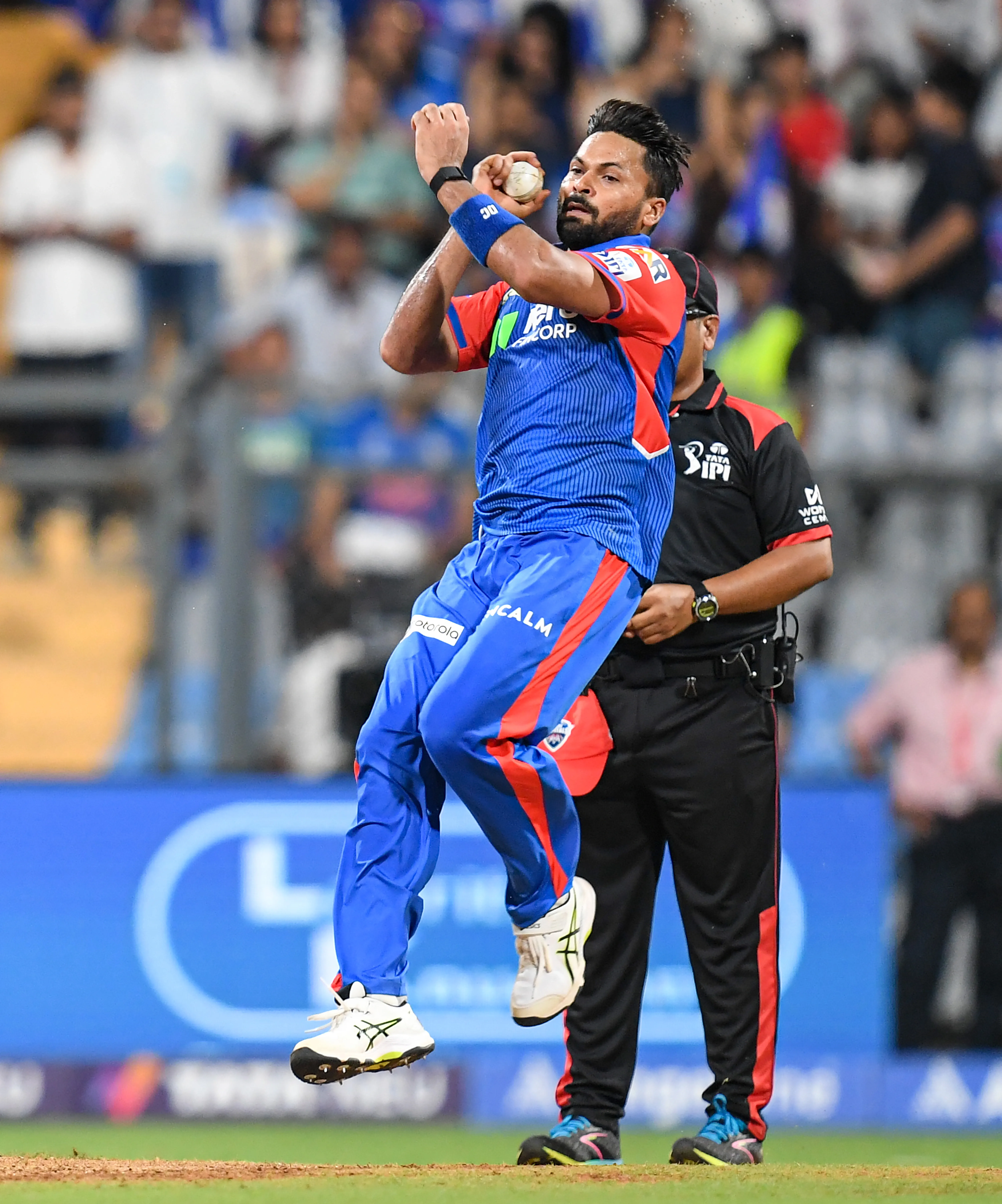 What led to DC seamer Mukesh Kumar's fine and demerit point?