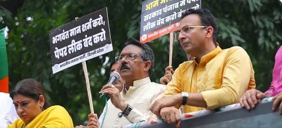 Delhi BJP chief Harsh Malhotra leads protest over Punjab paper leaks, demands Bains' dismissal