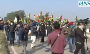 Farmers' 'Delhi Chalo' March Halted After Injuries from Tear Gas Shelling