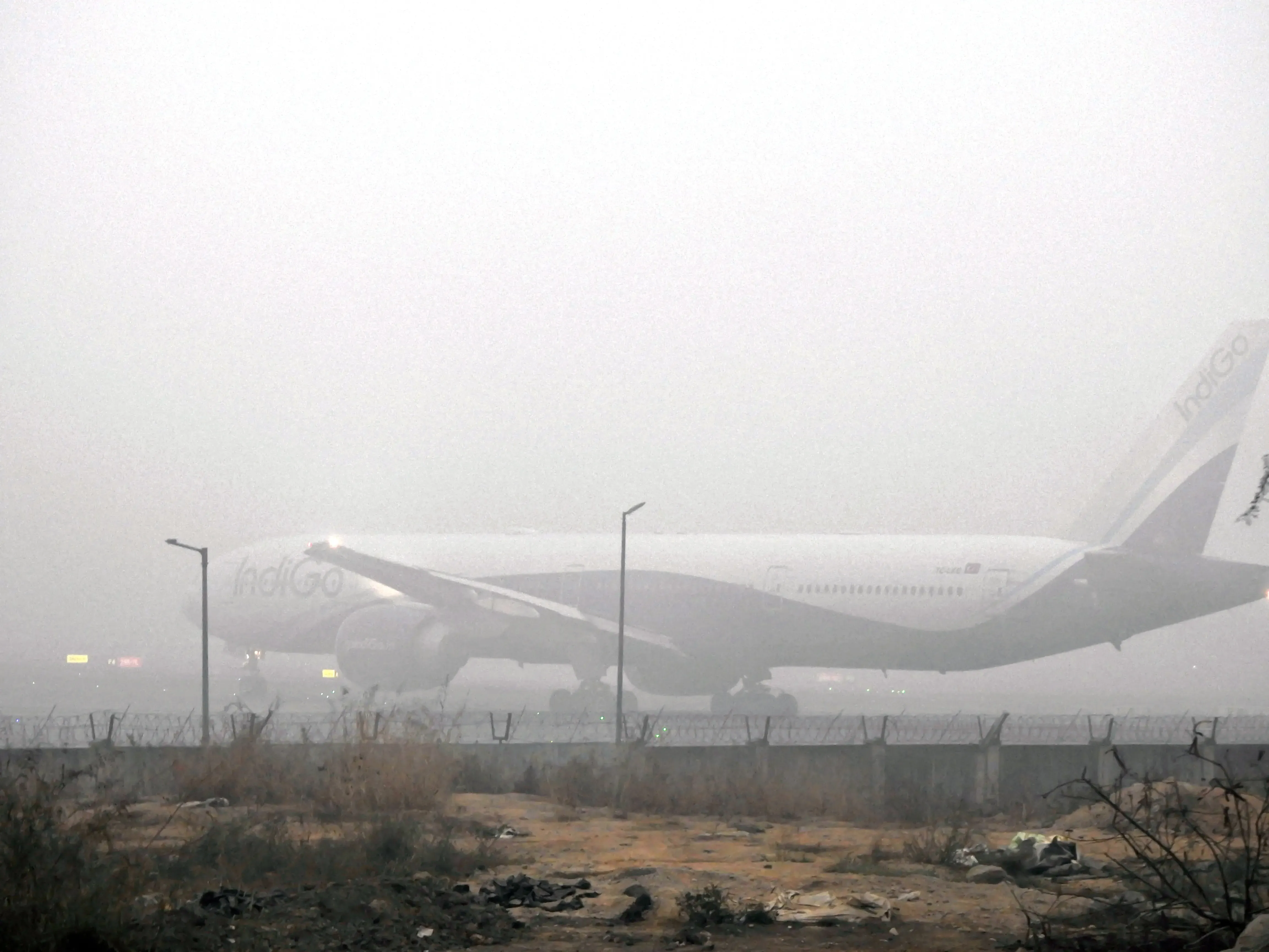 How is dense fog affecting flight operations?