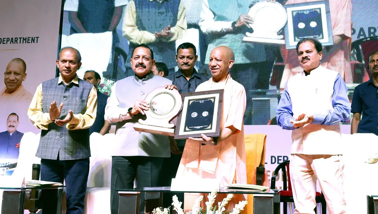 Dr. Jitendra Singh presents IMD 150th anniversary coin to CM Yogi