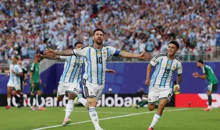 Messi hat-trick equals Klose's 16-goal record as Argentina beat Algeria 3-0
