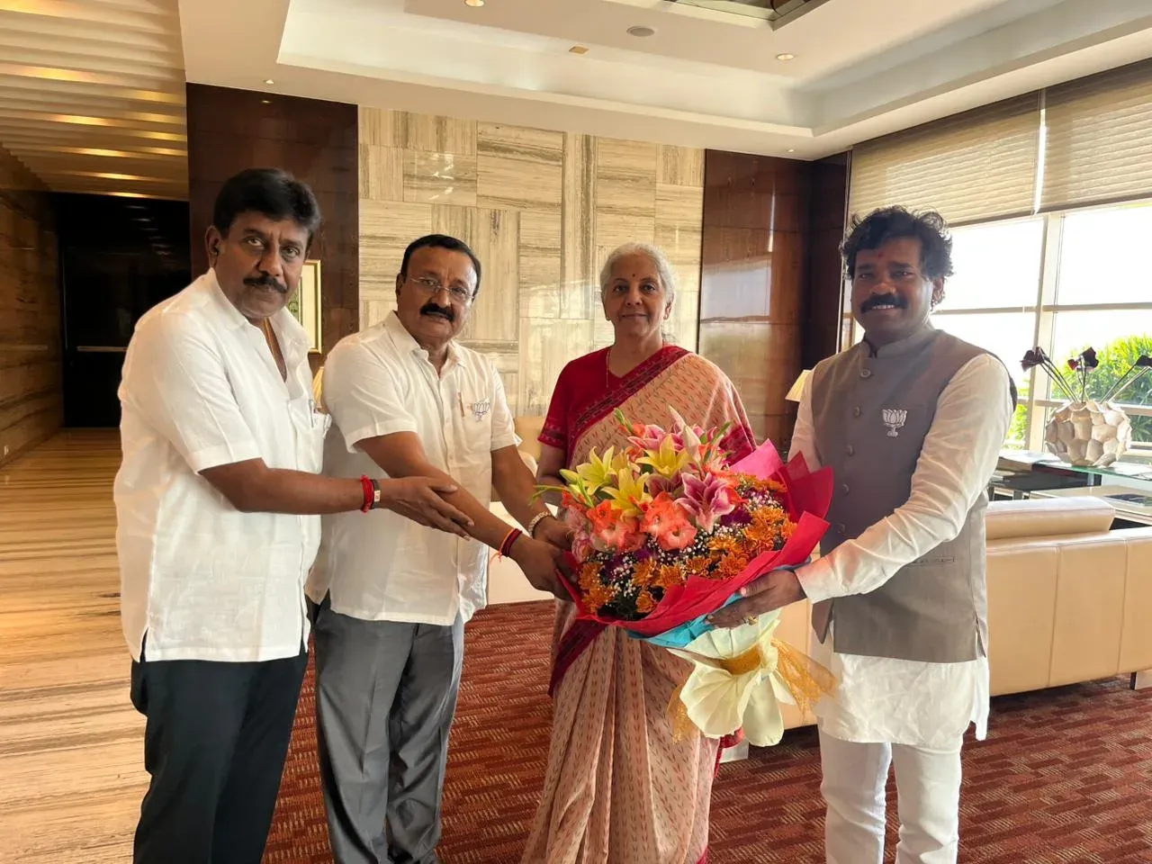 Finance Minister Sitharaman arrives in Bengaluru, welcomed by BJP Karnataka