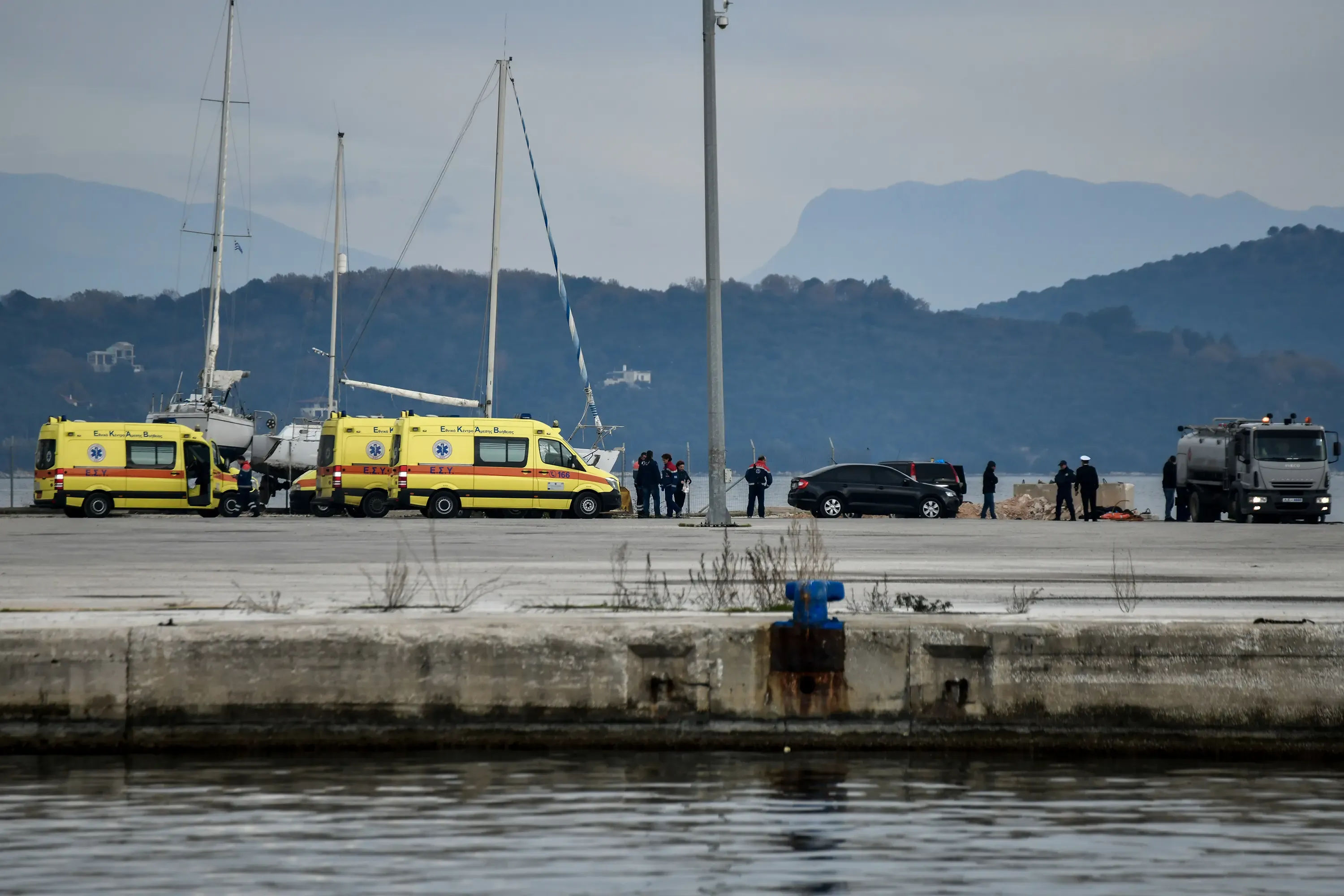 What led to the tragic loss of five migrants and the disappearance of 20 others south of Crete?