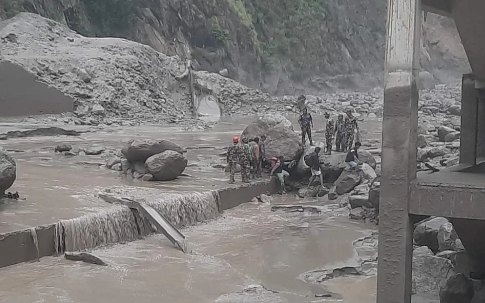 What Impact Did Flash Floods Have on the Nepal-China Trade Route?