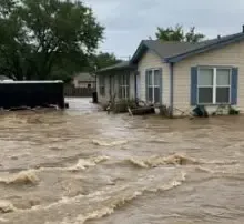 How did flooding in Texas lead to 49 fatalities and 27 missing children?