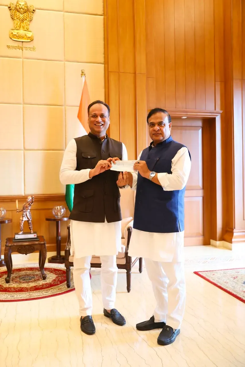 Former MLA Hemanga Hands ₹20,000 to Assam CM Relief Fund