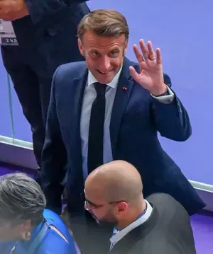 Is French President Emmanuel Macron Visiting India for the AI Impact Summit in February?