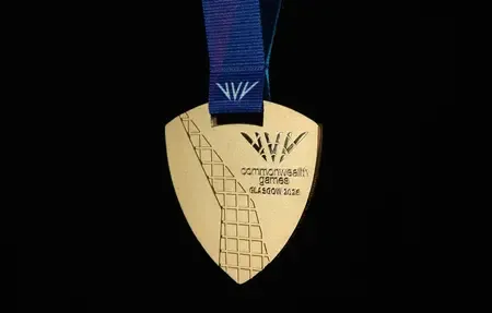 Glasgow 2026 CWG medals debut Reuleaux triangle design with braille, tartan motifs