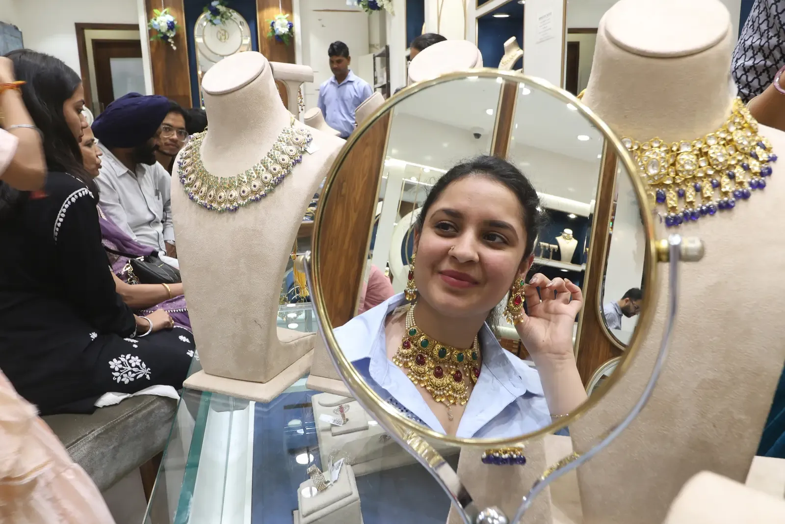 Gold, silver surge up to 3% this week as crude oil dip eases inflation fears
