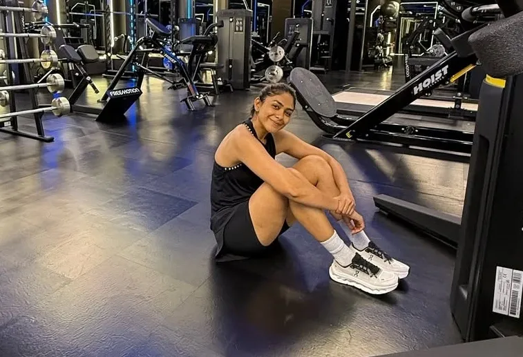 Who is Mrunal Thakur missing during her gym time?