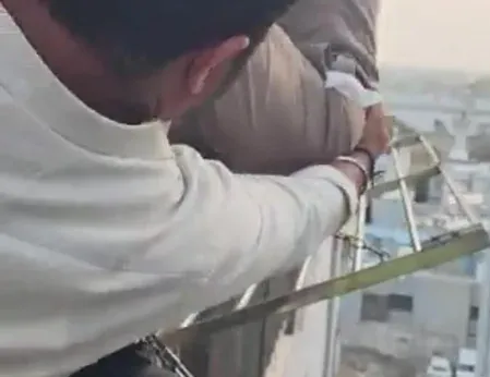 Surat cop climbs building exterior to rescue man from locked 7th-floor flat