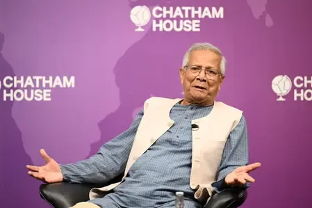 Why is Muhammad Yunus Holding onto Chair? (IANS Analysis)