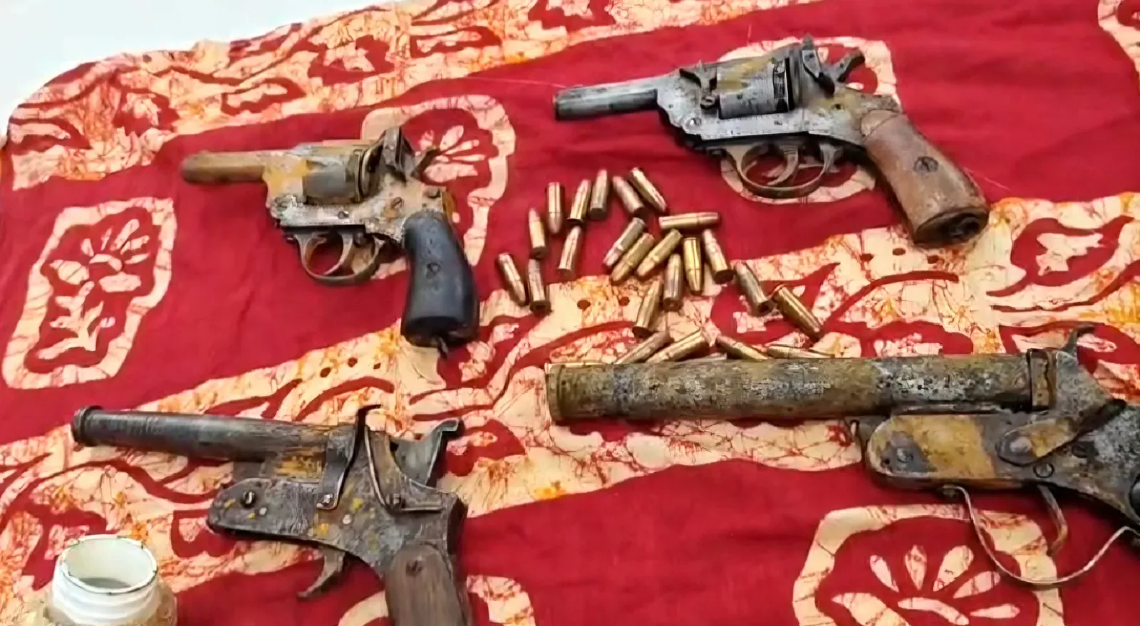 Arms cache in West Bengal fish pond: 8 pistols, 97 rounds seized in Habra