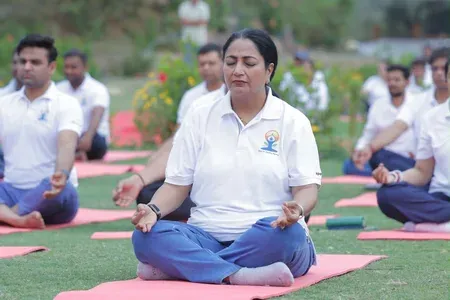 Delhi CM Rekha Gupta leads Yoga Day at Asola-Bhati Blue Lake