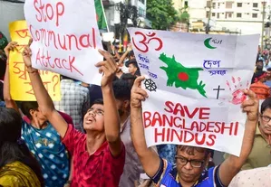 India urges Bangladesh to curb extremists, protect Hindu minorities