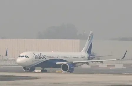 Why Did IndiGo Shares Plummet Over 3% Amid Major Flight Cancellations?