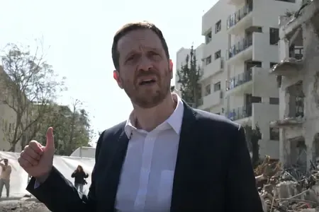 Israeli Official Accuses Iran of Targeting Civilians in Ballistic Missile Strikes, Labels as 'War Crimes'