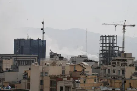 Iran fires missiles at Israel, warns of more 'crushing blows' over Lebanon