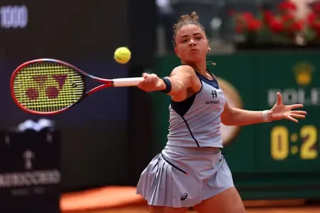 Mertens stuns defending champ Paolini from three match points down at Italian Open