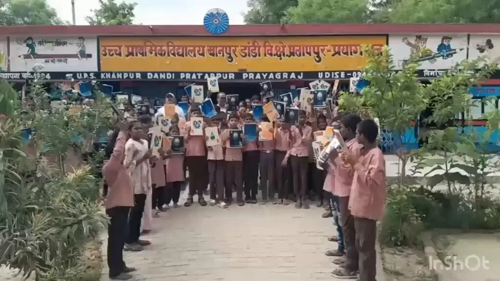 Jal Shakti Minister Paatil distributes notebooks in Prayagraj schools