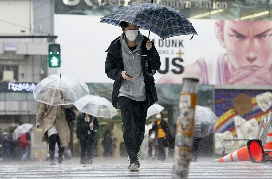 Has Japan issued a heavy rain emergency warning for Kumamoto?