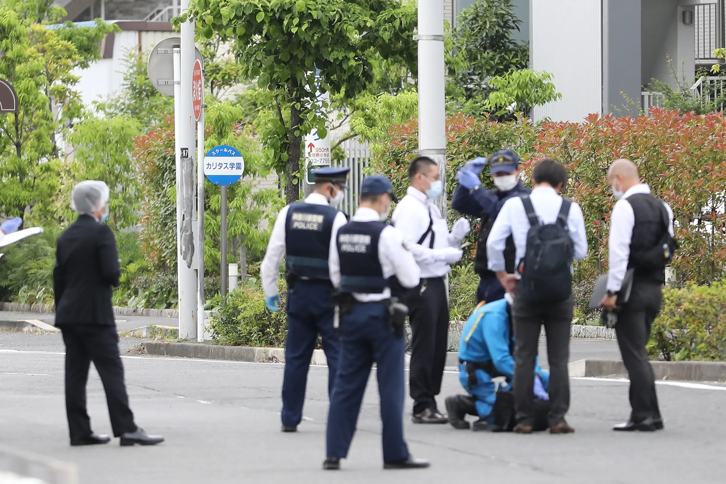 Why was a man arrested for stabbing two individuals in Fukuoka?