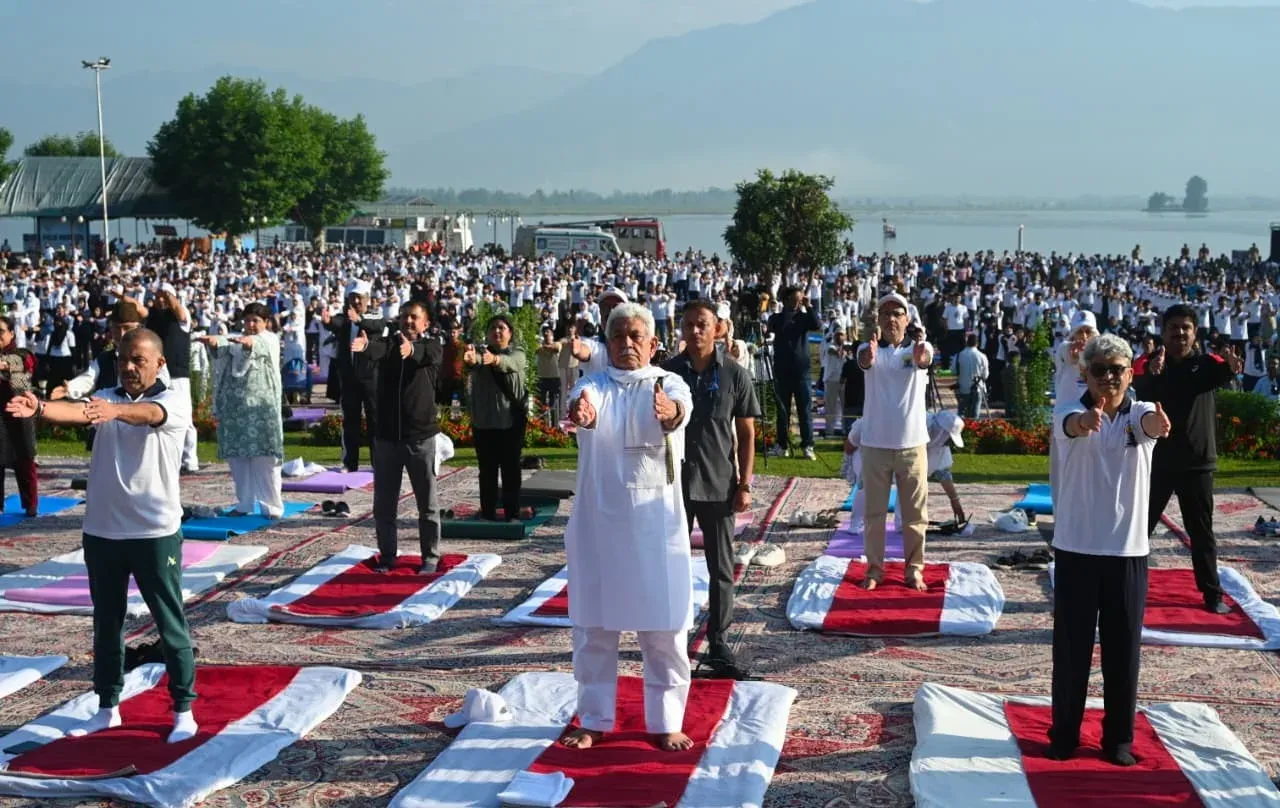 Yoga Day 2025: J&K L-G Sinha leads thousands at Dal Lake, Jammu events draw forces
