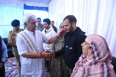 J&K L-G Manoj Sinha visits martyr cop Ashiq Hussain Qureshi's family in Budgam